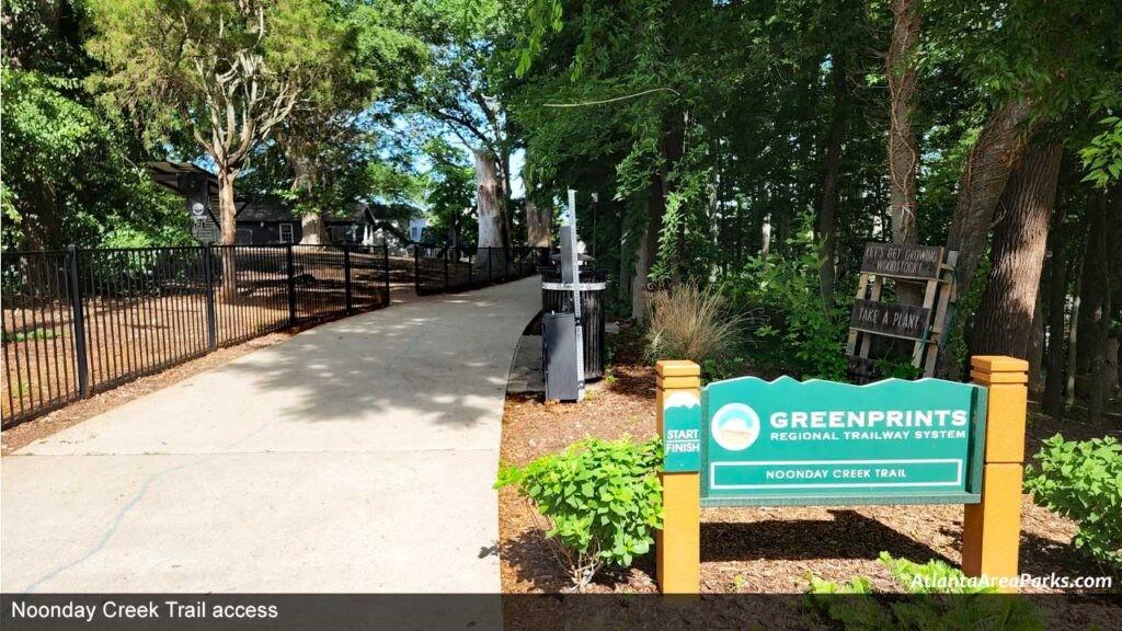 8255 Main Street, Unit 2 Woodstock, GA 30188 - Photo 42 of 46 a view of a bench sitting in the backyard