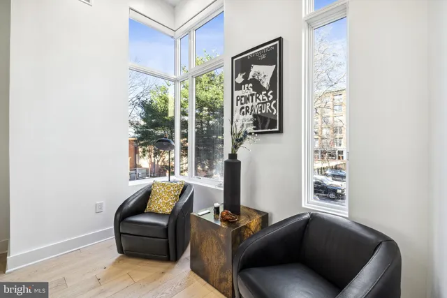 a bed room with bed and window