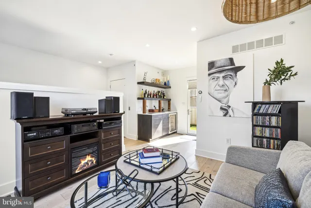 a kitchen with stainless steel appliances a sink and cabinets