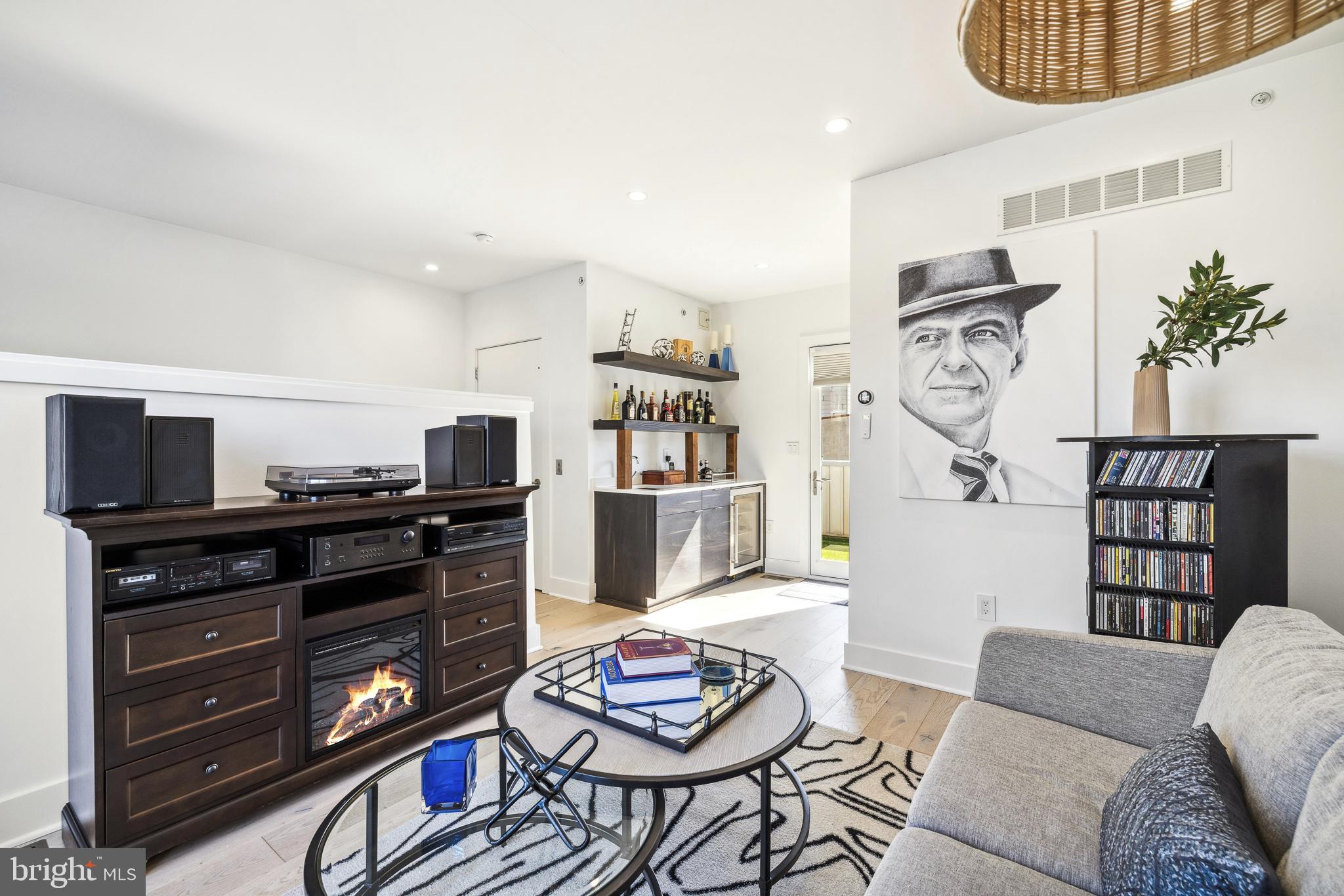48 North 3rd Street, Unit 3 Philadelphia, PA 19106 - Photo 28 of 36 a living room with furniture and wooden floor