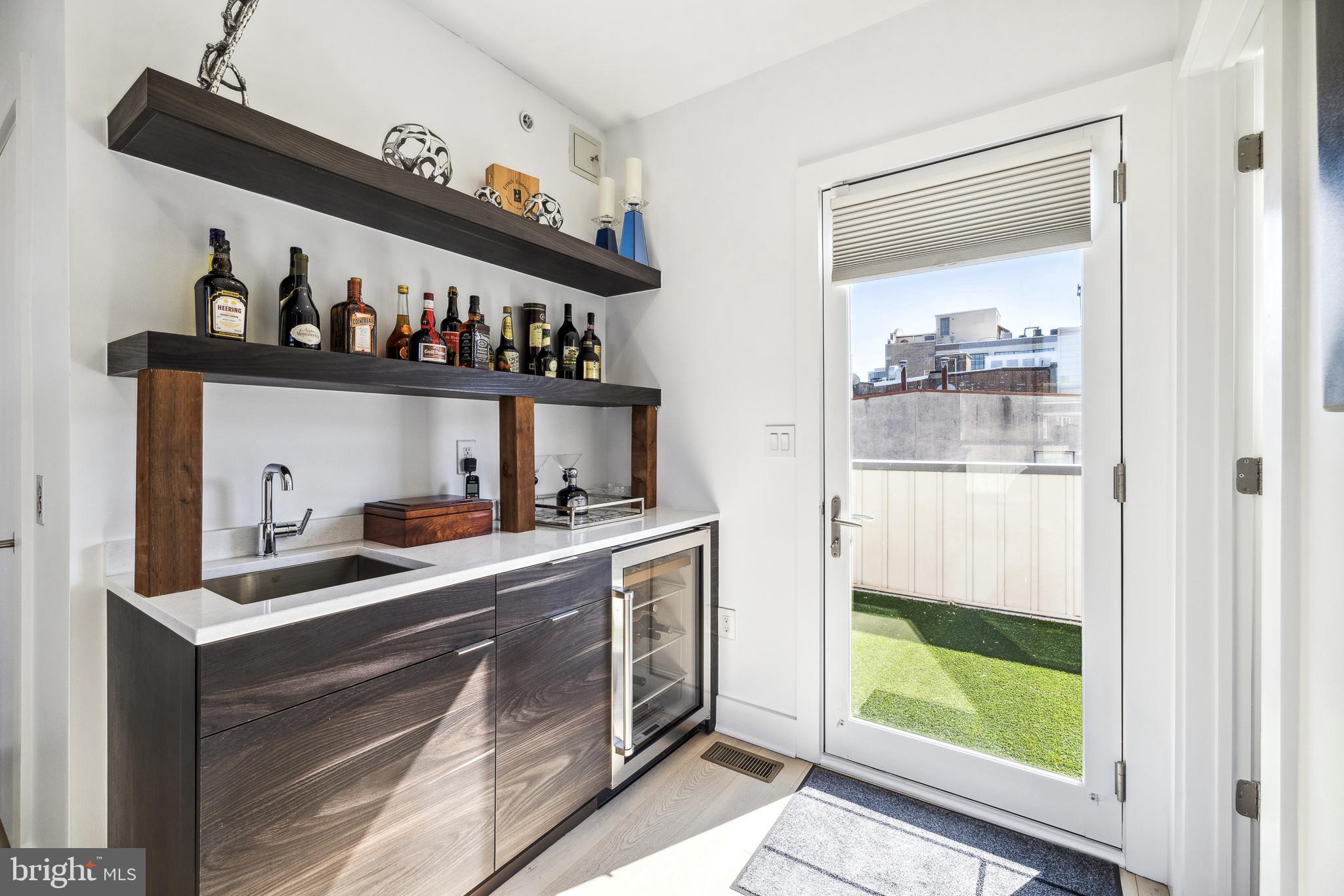 48 North 3rd Street, Unit 3 Philadelphia, PA 19106 - Photo 29 of 36 a kitchen with stainless steel appliances a sink and cabinets