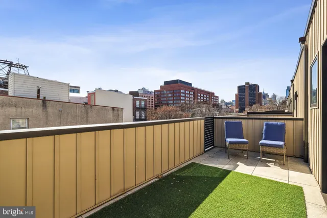 a bathroom with a sink toilet a mirror and shower