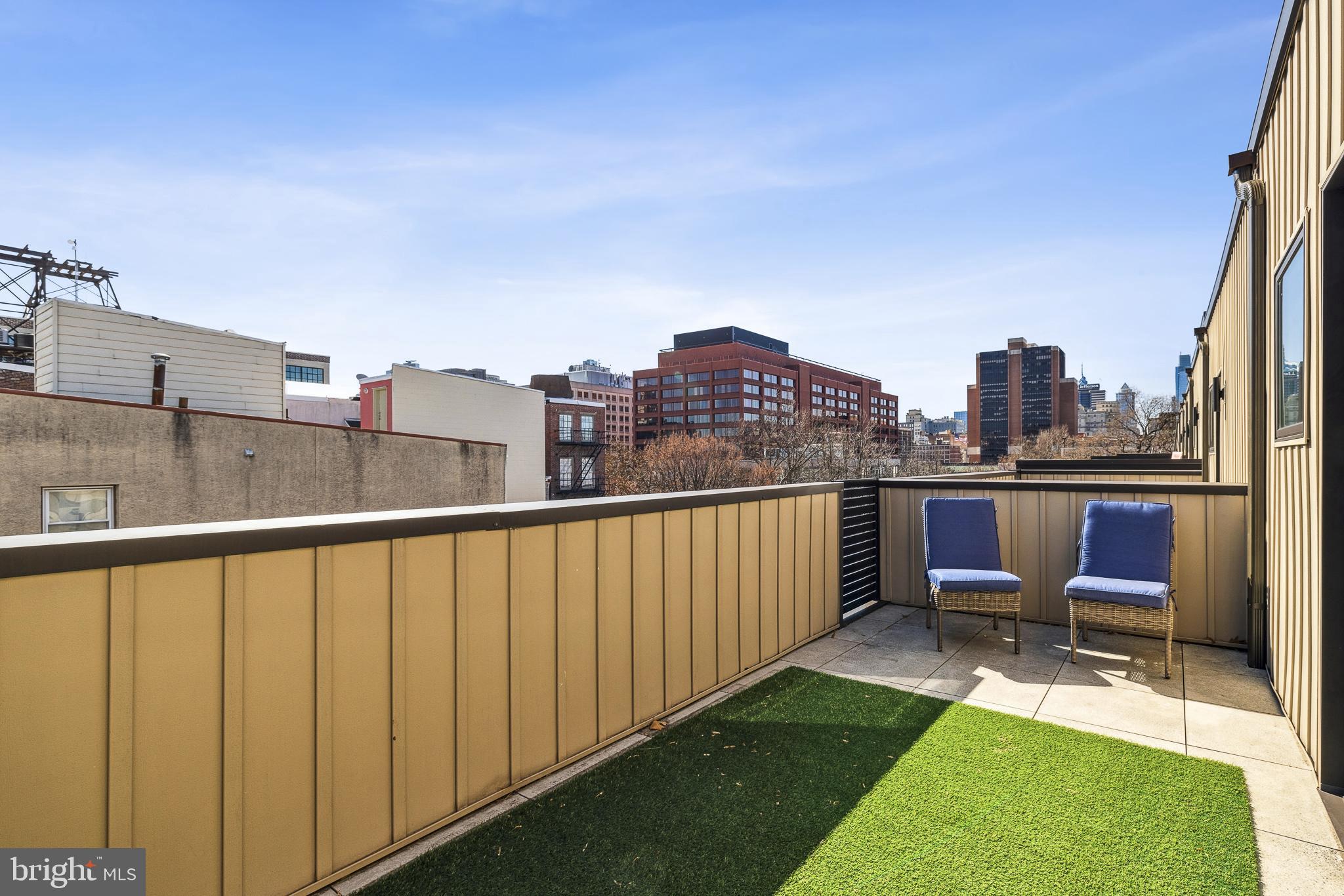 48 North 3rd Street, Unit 3 Philadelphia, PA 19106 - Photo 31 of 36 a view of a balcony with a chair and iron fence