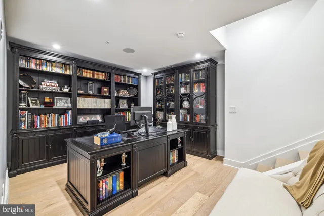 a kitchen with stainless steel appliances a refrigerator and a window