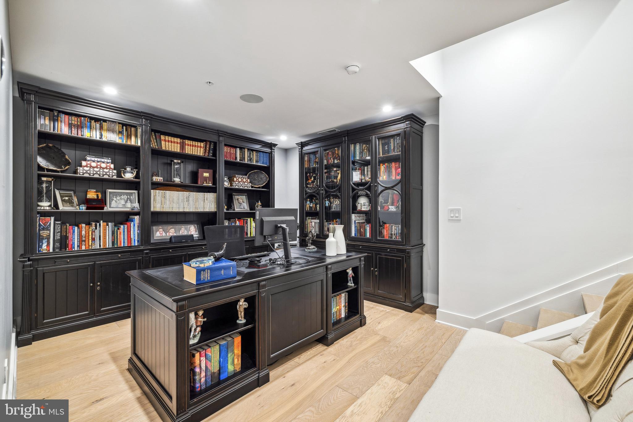 48 North 3rd Street, Unit 3 Philadelphia, PA 19106 - Photo 33 of 36 a kitchen with stainless steel appliances granite countertop a stove and a bookshelf