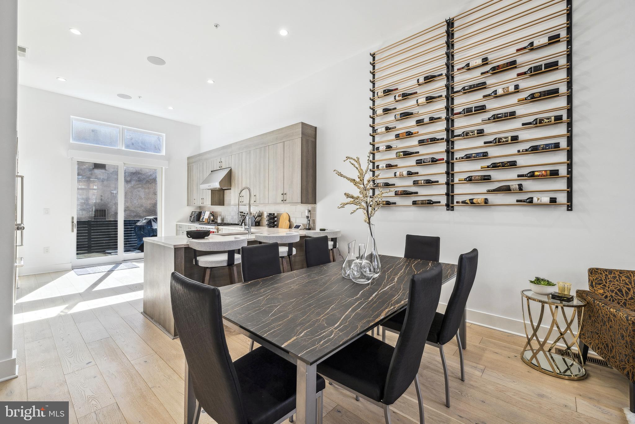 48 North 3rd Street, Unit 3 Philadelphia, PA 19106 - Photo 6 of 36 a view of a dining room with furniture and chandelier