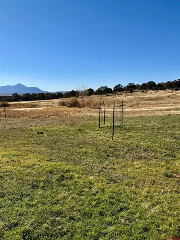 a view of lake with sunset