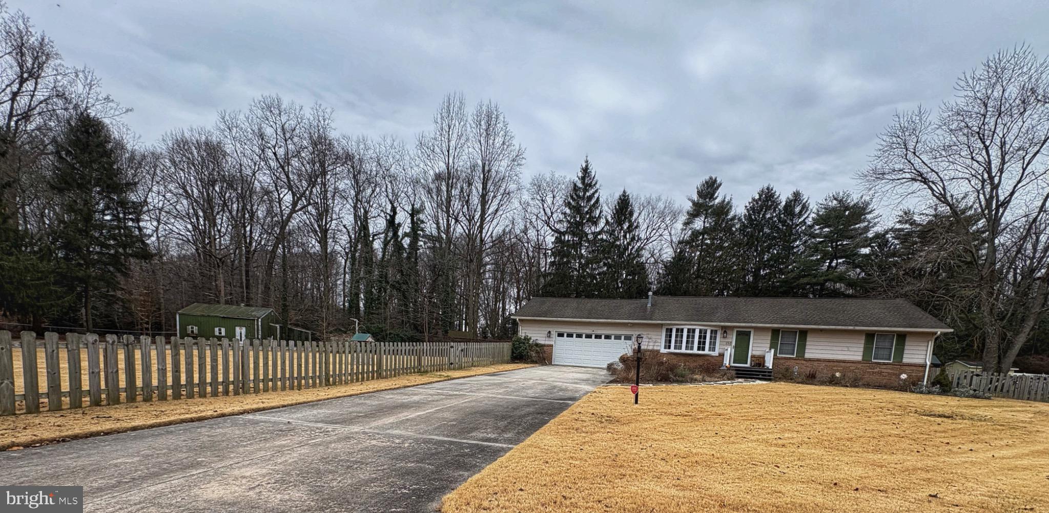 152 Pine Bluff Road Felton, DE 19943 - Photo 2 of 16 Charming home with spacious yard and trees.