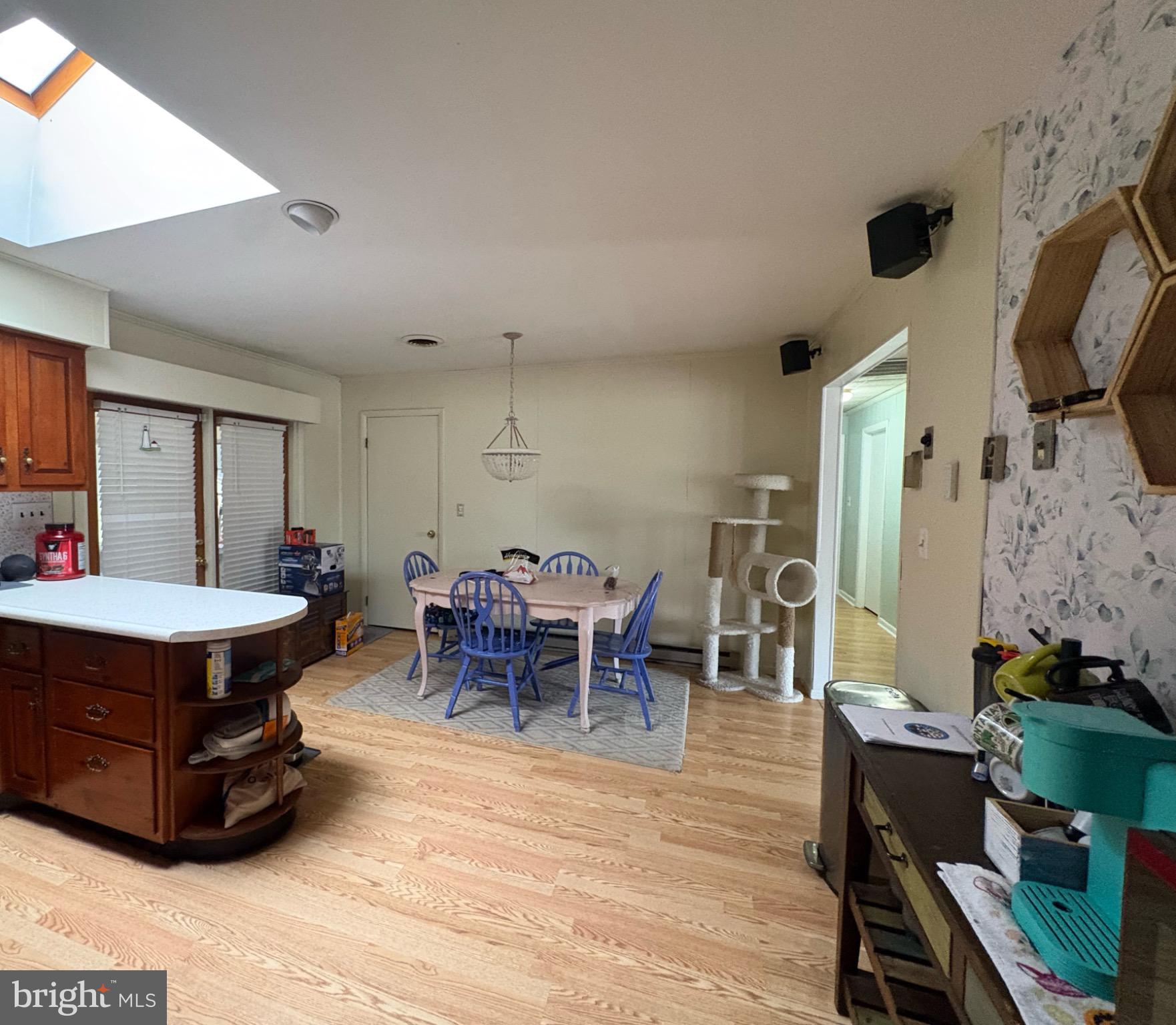 152 Pine Bluff Road Felton, DE 19943 - Photo 7 of 16 Bright and airy kitchen with dining area.