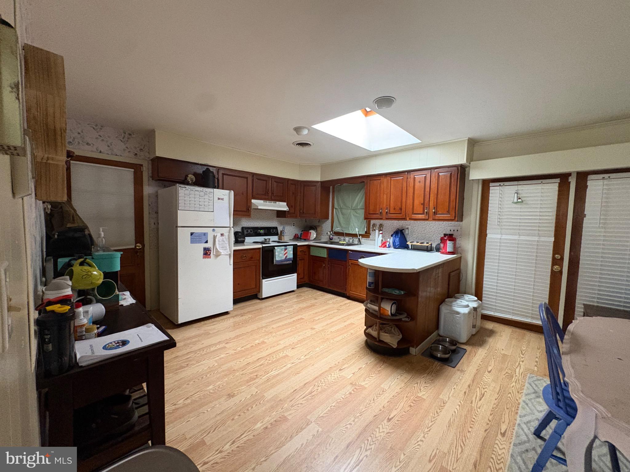 152 Pine Bluff Road Felton, DE 19943 - Photo 8 of 16 Bright and inviting kitchen with natural light.