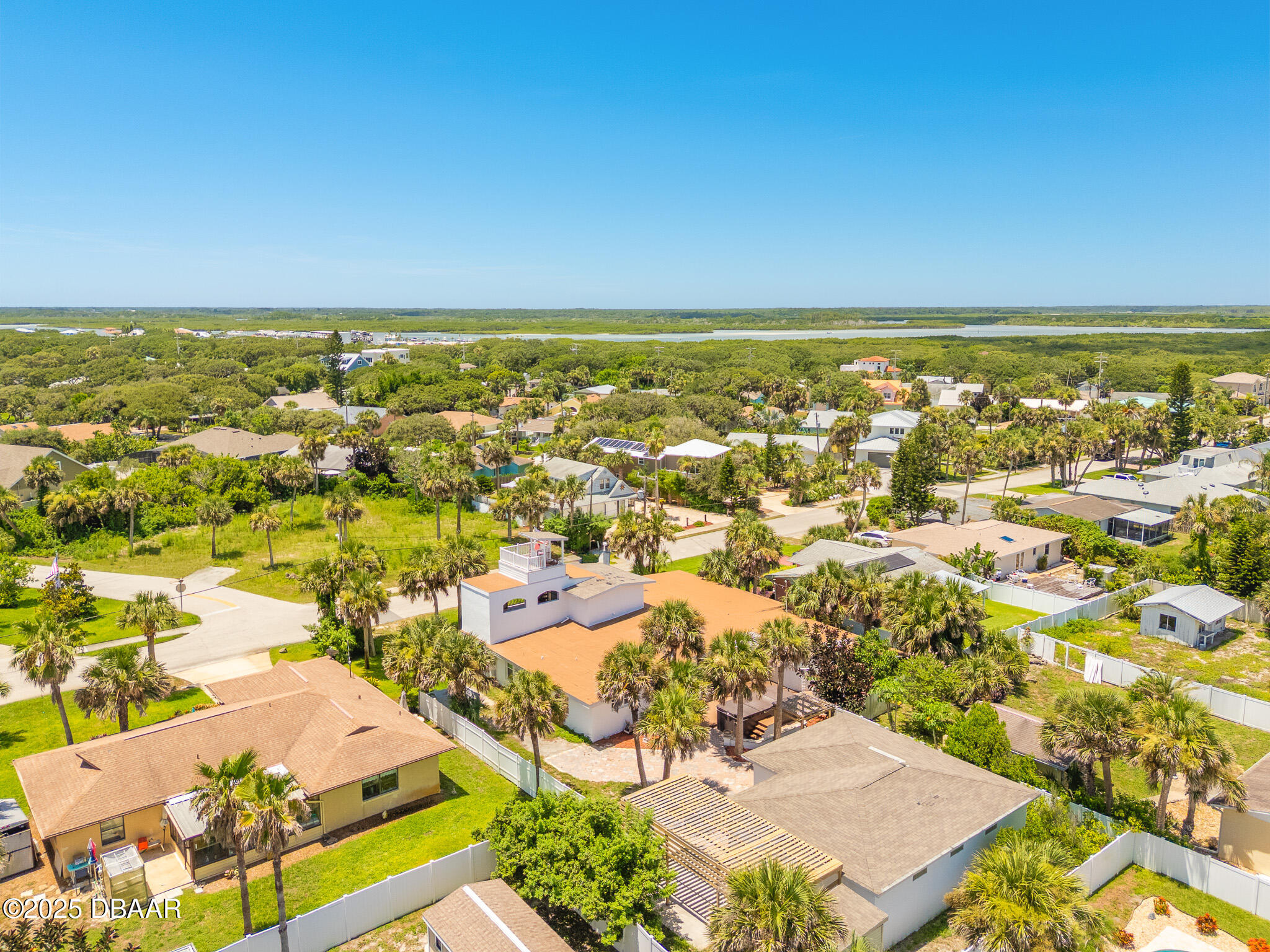 46 Oceanview Avenue Ponce Inlet, FL 32127 - Photo 75 of 79 an aerial view of residential houses with outdoor space
