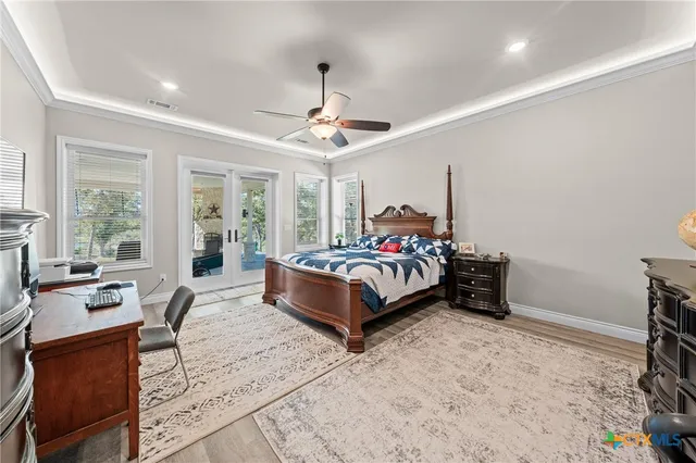 a bedroom with a bed and a couch