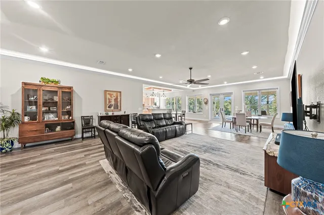 a living room with furniture and a table