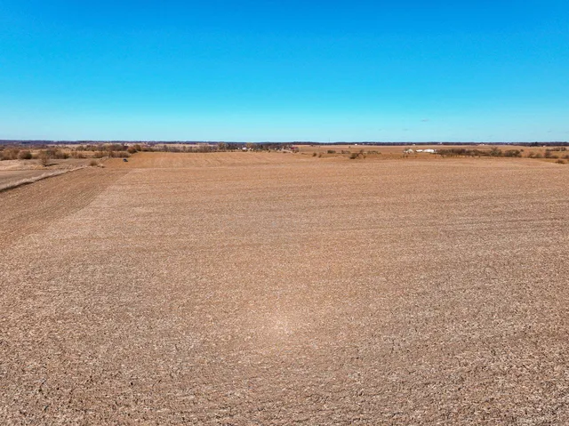 an aerial view of beach and ocean