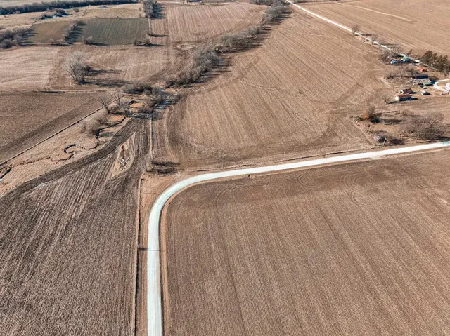 a view of a lake with lots of trees