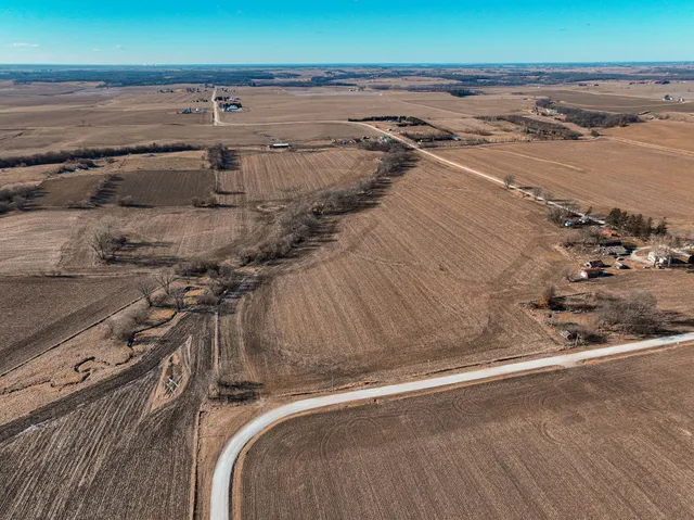 an aerial view of beach and ocean