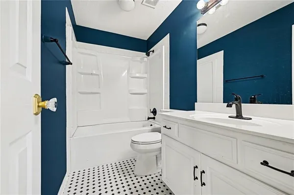 $450,000 | 1012 Northeast Barnes Drive, Lee's Summit, MO 64086