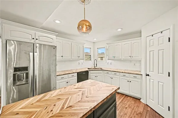 $450,000 | 1012 Northeast Barnes Drive, Lee's Summit, MO 64086