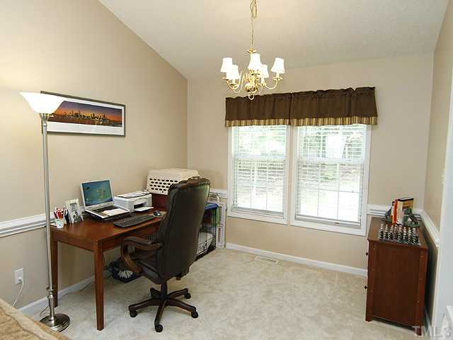 2504 Bulmer Terrace Raleigh, NC 27615 - Photo 3 of 12 a view of a workspace with furniture and a window