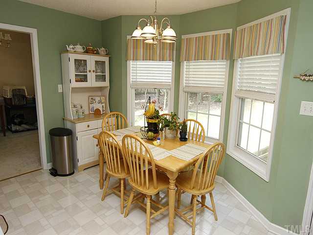 2504 Bulmer Terrace Raleigh, NC 27615 - Photo 5 of 12 a dining room with furniture and window