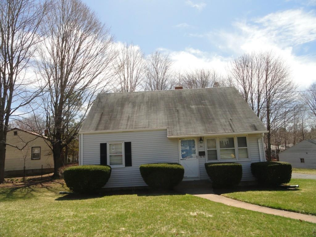 10 Baker Road Hamden, CT 06514 - Photo 1 of 1 a front view of house with yard and trees in the background