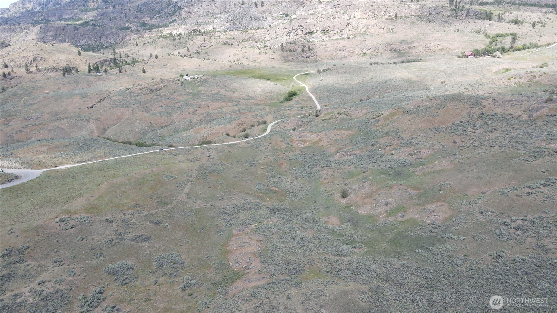 -lot B Swanson Mill Road Oroville, WA 98844 - Photo 6 of 13 a view of a backyard of the house