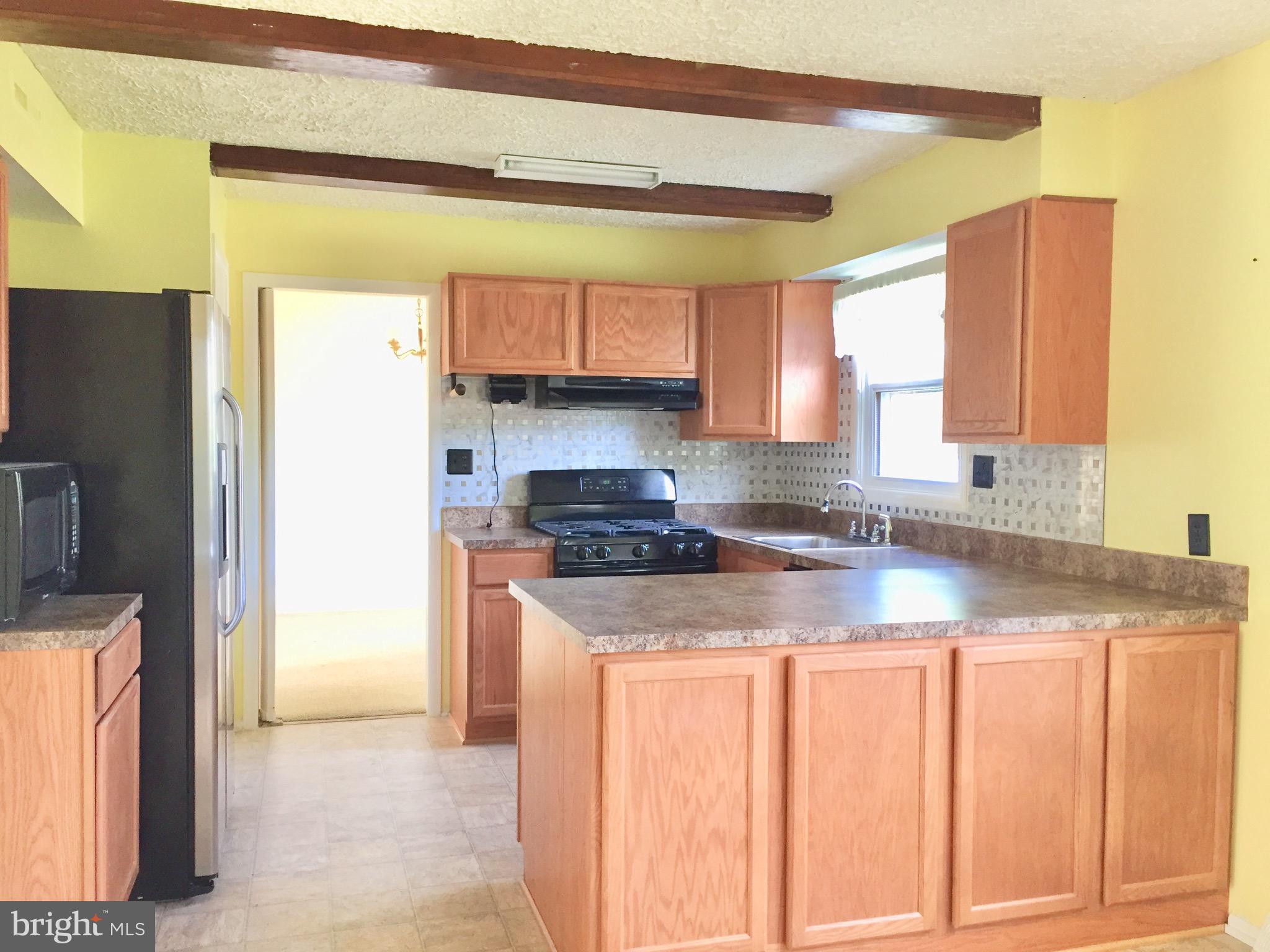 409 Latimer Road Joppa, MD 21085 - Photo 7 of 30 Cabinets and countertops all have been replaced