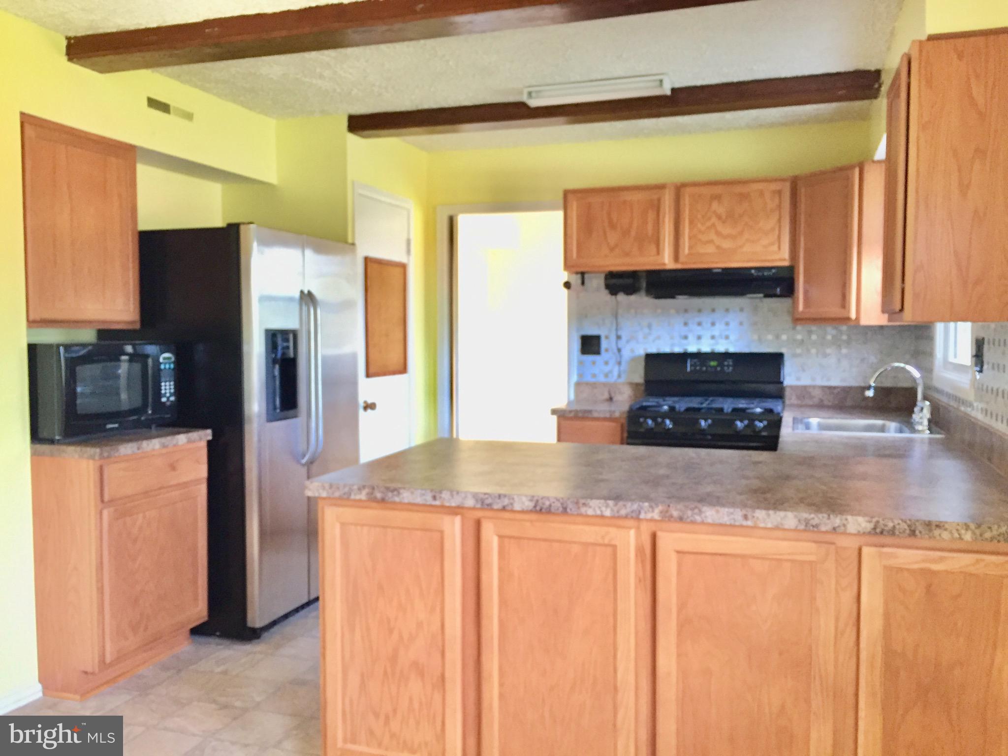 409 Latimer Road Joppa, MD 21085 - Photo 9 of 30 All stainless appliances