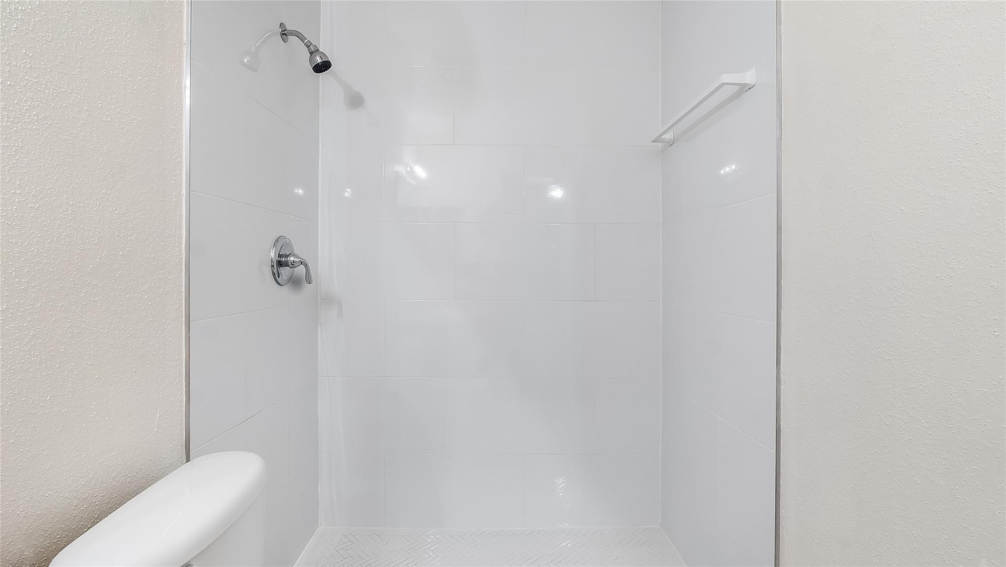 875 Riverside Drive, Unit 717 Coral Springs, FL 33071 - Photo 19 of 31 a bathroom with a shower