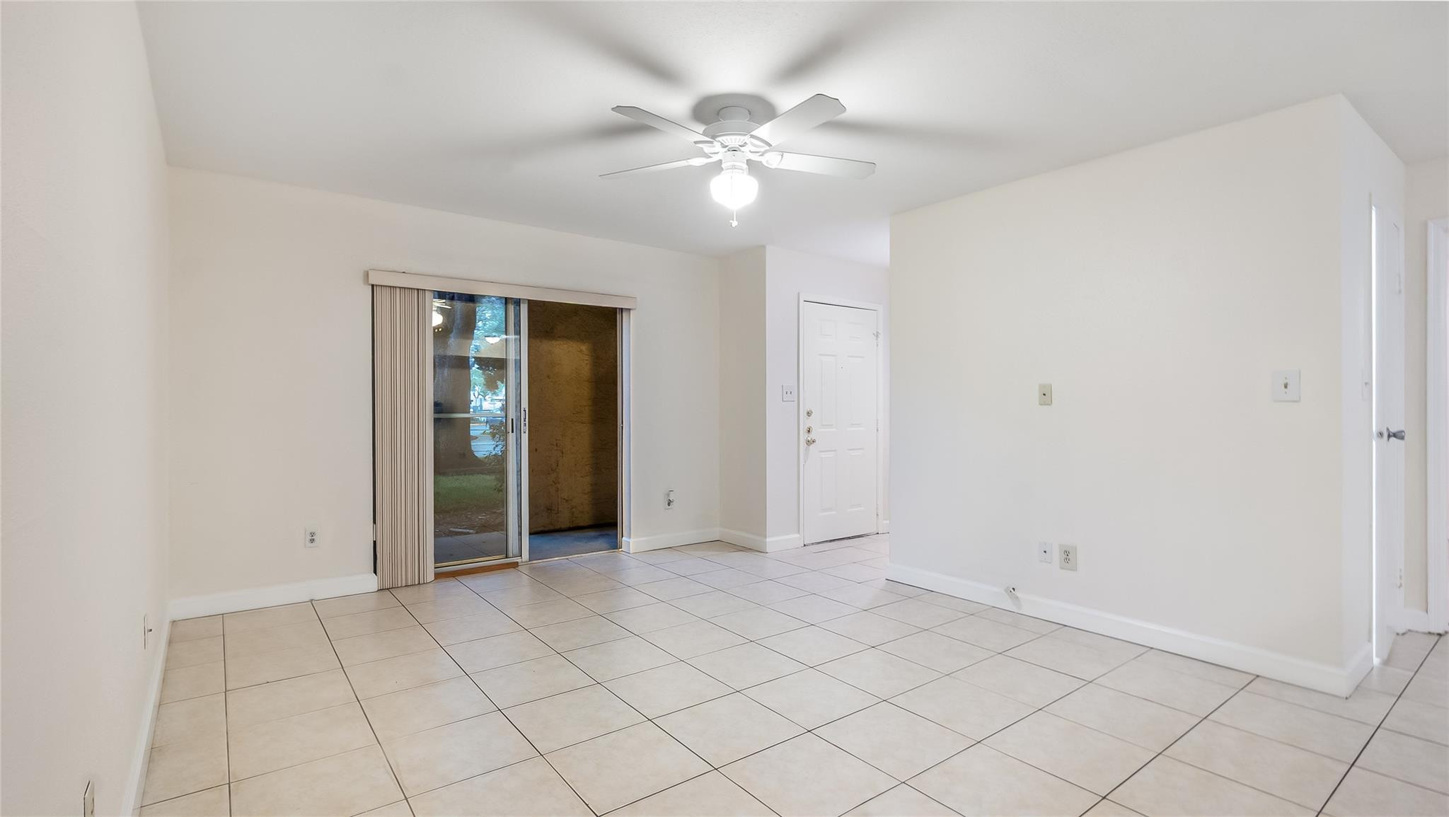875 Riverside Drive, Unit 717 Coral Springs, FL 33071 - Photo 4 of 31 an empty room with fan and fan