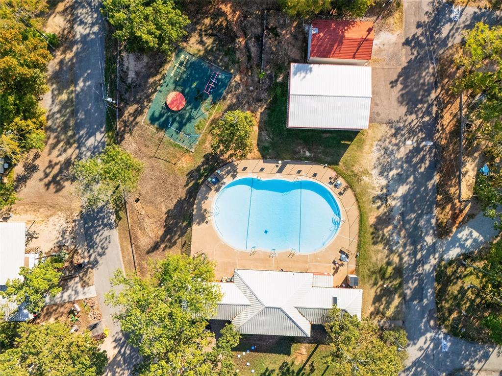 Lot 135-136 Private Road, Unit 5819 Yantis, TX 75497 - Photo 17 of 18 an aerial view of a house with a swimming pool