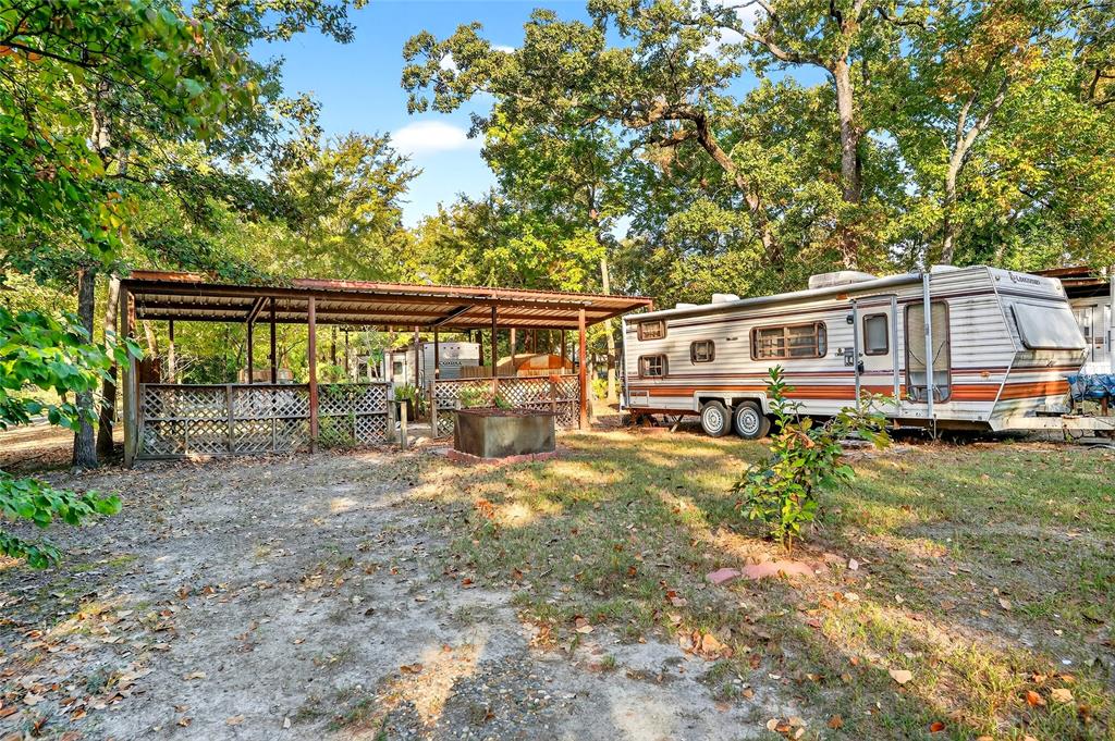 Lot 135-136 Private Road, Unit 5819 Yantis, TX 75497 - Photo 6 of 18 a view of a house with backyard from deck