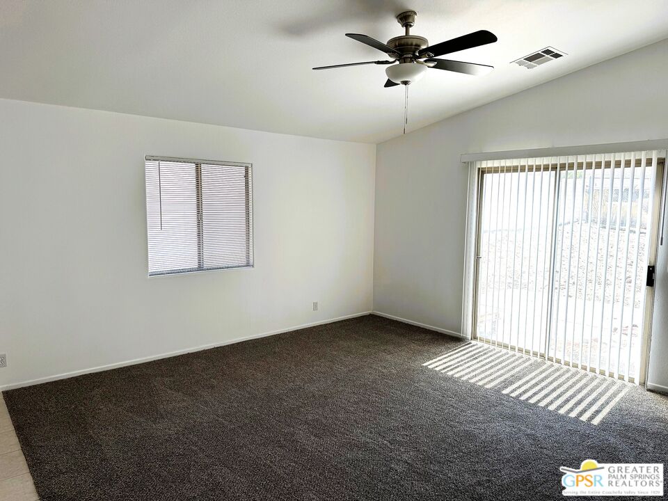 9700 Santa Cruz Road Desert Hot Springs, CA 92240 - Photo 12 of 37 a view of an empty room with a window