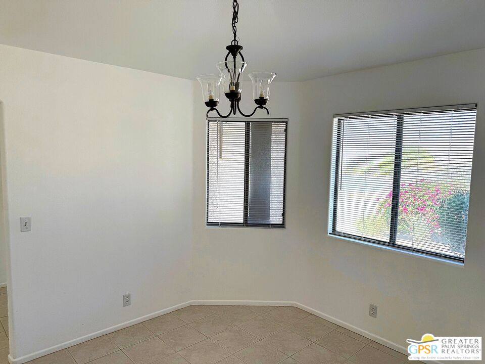 9700 Santa Cruz Road Desert Hot Springs, CA 92240 - Photo 15 of 37 a window in an empty room
