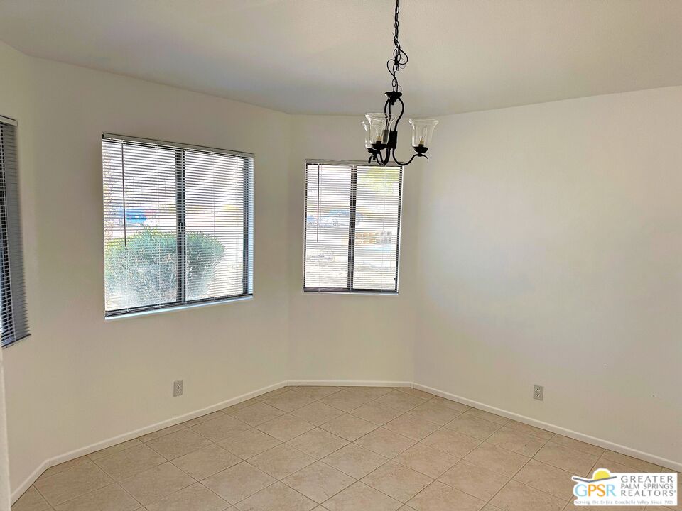 9700 Santa Cruz Road Desert Hot Springs, CA 92240 - Photo 16 of 37 a view of an empty room with a window