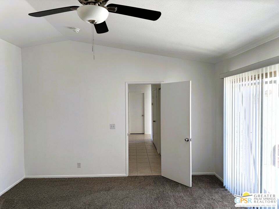 9700 Santa Cruz Road Desert Hot Springs, CA 92240 - Photo 20 of 37 a view of an empty room with a window