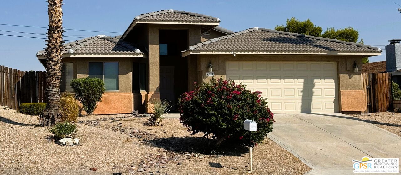 9700 Santa Cruz Road Desert Hot Springs, CA 92240 - Photo 2 of 37 a front view of a house