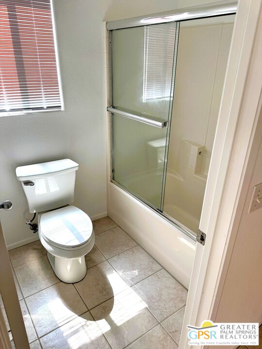 9700 Santa Cruz Road Desert Hot Springs, CA 92240 - Photo 25 of 37 a bathroom with a toilet and a shower