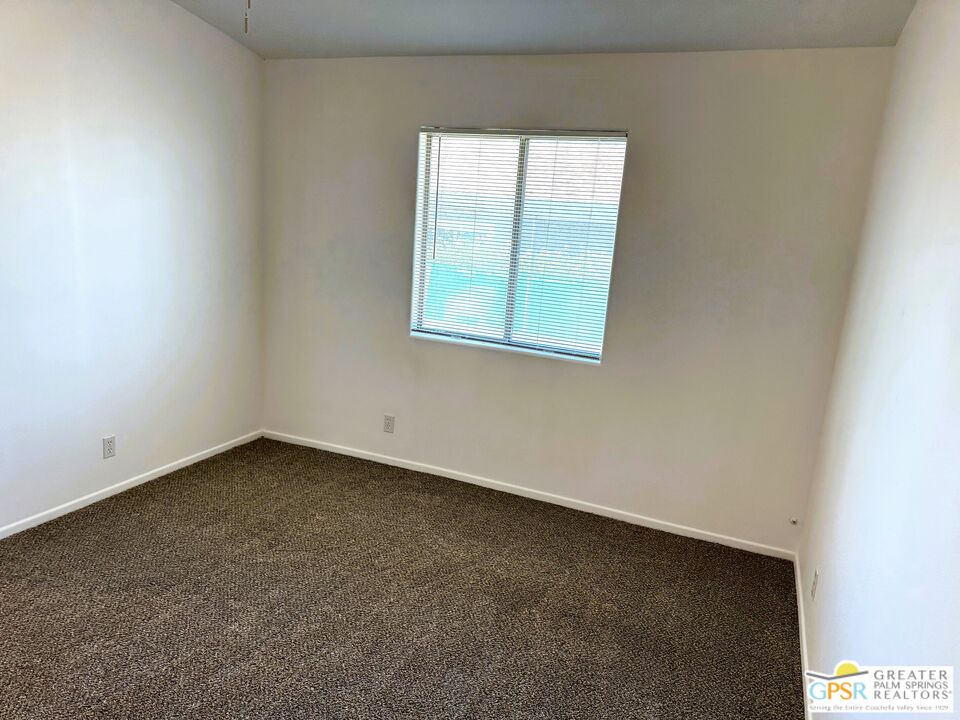 9700 Santa Cruz Road Desert Hot Springs, CA 92240 - Photo 26 of 37 an empty room with a window