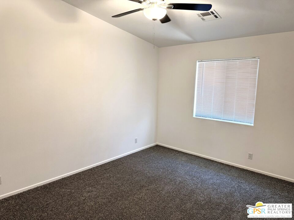 9700 Santa Cruz Road Desert Hot Springs, CA 92240 - Photo 31 of 37 an empty room with a window