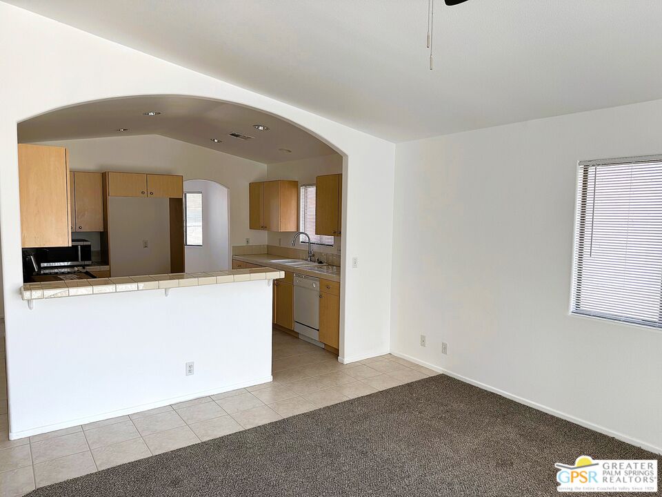 9700 Santa Cruz Road Desert Hot Springs, CA 92240 - Photo 10 of 37 a view of a kitchen with a sink