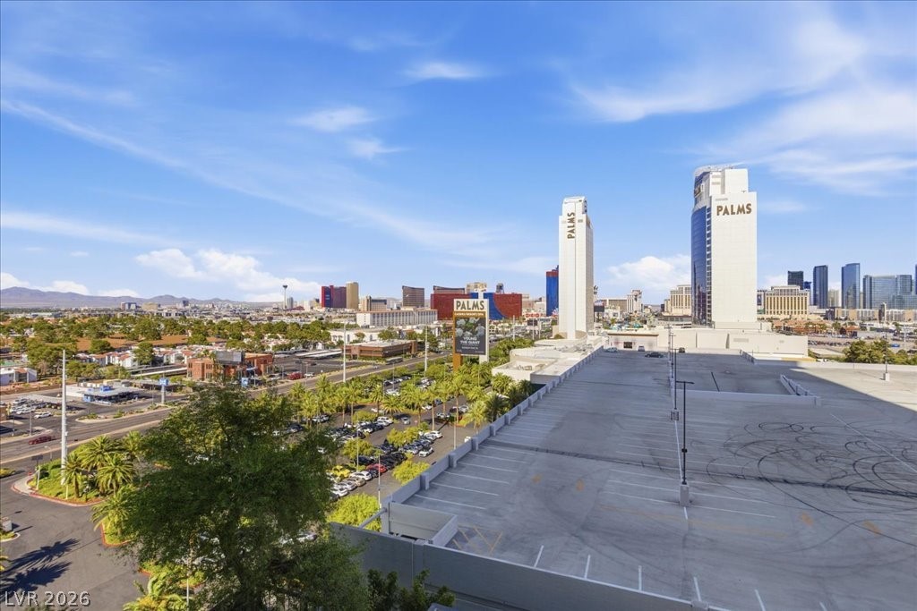 4381 West Flamingo Road, Unit 10306 Las Vegas, NV 89103 - Photo 23 of 26 This elevated perspective captures the expansive urban landscape under a broad sky, offering an impressive city vista.