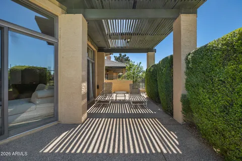 a view of balcony with wooden floor