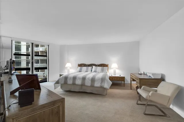 a bedroom with a bed and furniture