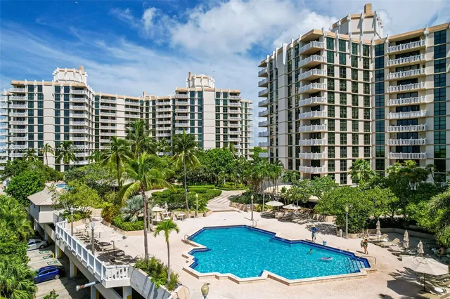 a view of a swimming pool with a patio