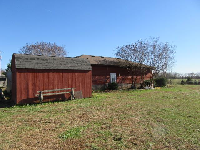 3064 Battle Creek Road Springfield, TN 37172 - Photo 3 of 30 a front view of a house with garden