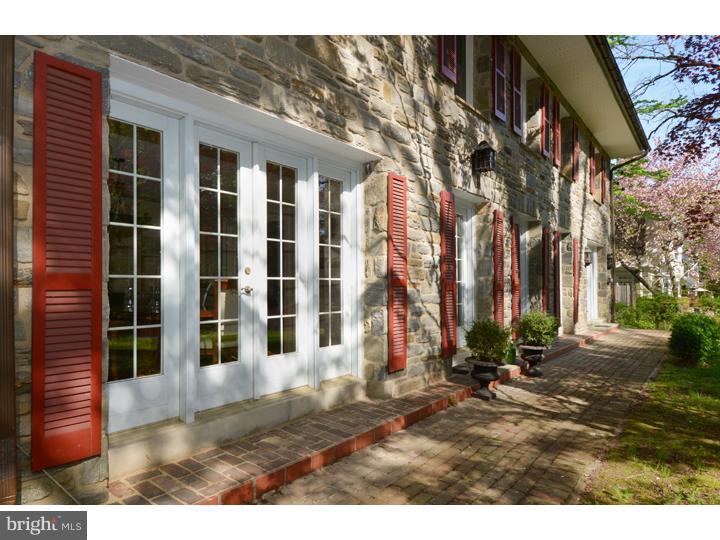 344 Penn Road Wynnewood, PA 19096 - Photo 2 of 25 a view of a brick house with many windows