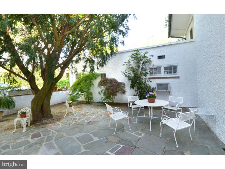 344 Penn Road Wynnewood, PA 19096 - Photo 14 of 25 a view of a patio with table and chairs and potted plants