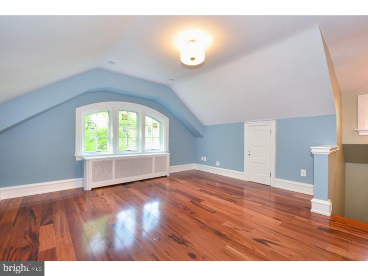 344 Penn Road Wynnewood, PA 19096 - Photo 17 of 25 a view of empty room with wooden floor and fan