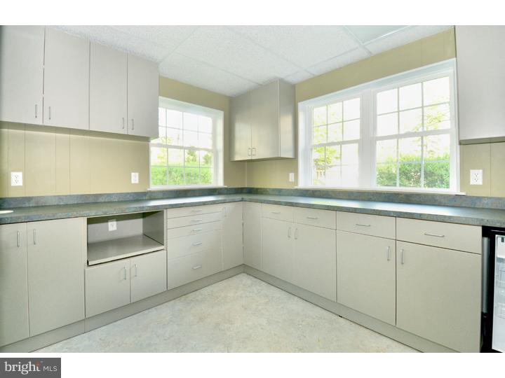 344 Penn Road Wynnewood, PA 19096 - Photo 18 of 25 a kitchen with granite countertop white cabinets and a sink